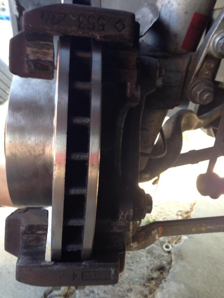 New brake rotor touching caliper bracket. NEED HELP!! BimmerFest BMW